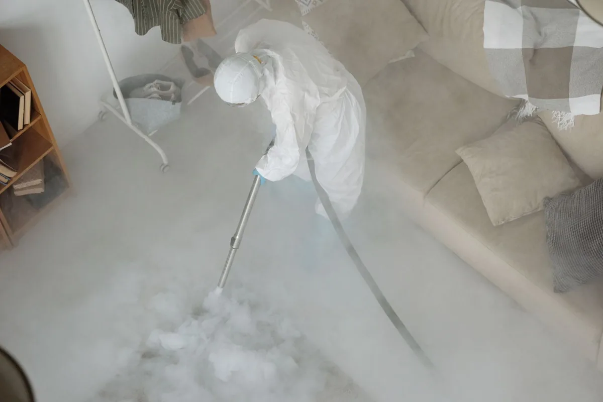 Biohazard cleanup technician in protective equipment, Ely, NV